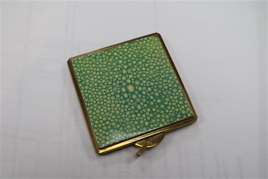 An Art Deco style faux shagreen combination compact, writing and cigarette case, and a compact